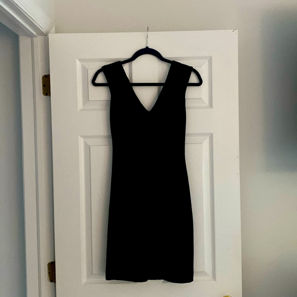 Black mini dress above the knee